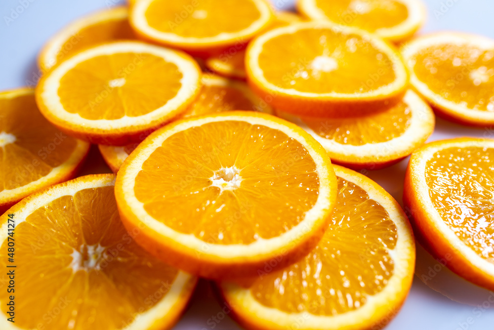 Fresh slised oranges on white background. Top view. Fresh slised oranges on white background. Top view.