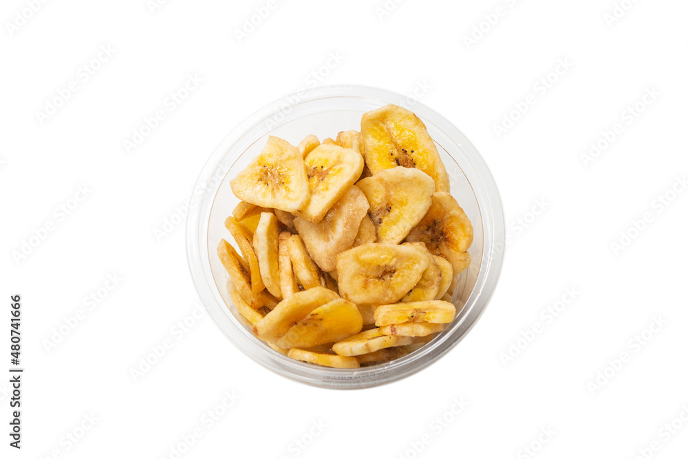 Banana chips isolated on a white background. Dehydrated banana. Banana chips isolated on a white background. Dehydrated banana.