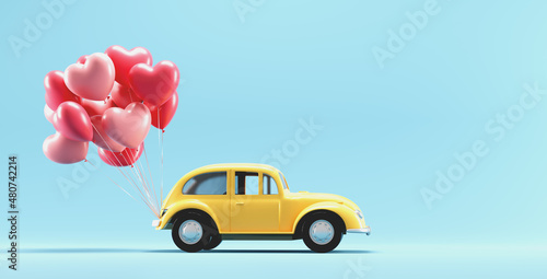 Heart balloons tied to toy car. Valentines day and love