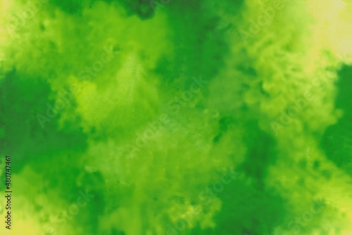 Abstract watercolor green background. Paint smears, splashes, streaks, blurring, gradient, drops. Texture, background design, banner, calendar, business card, postcard.