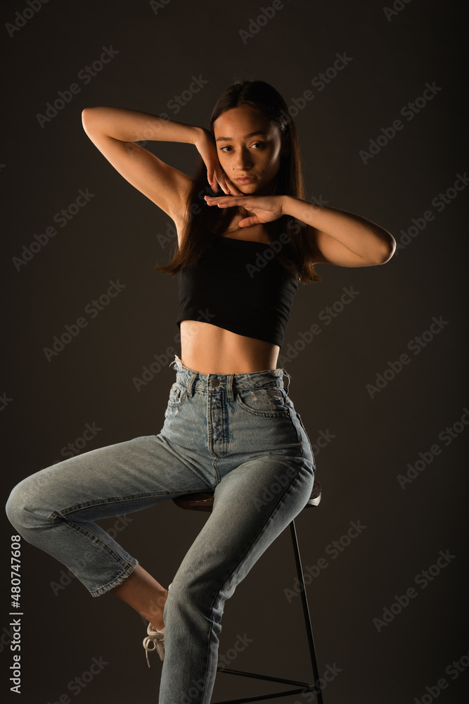 Portrait of girl posing while sitiing