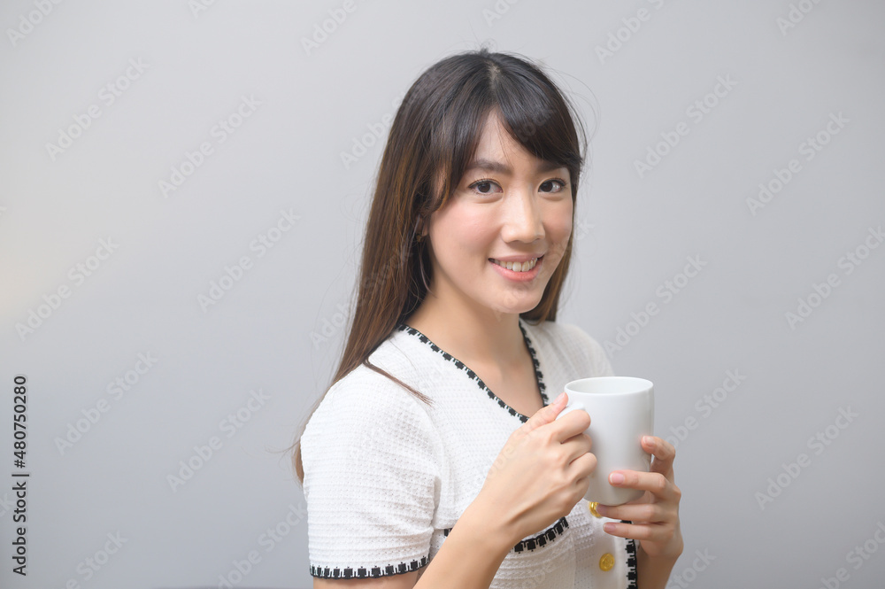 Portrait of young beautiful woman having a cup of coffee Portrait of young beautiful woman having a cup of coffee
