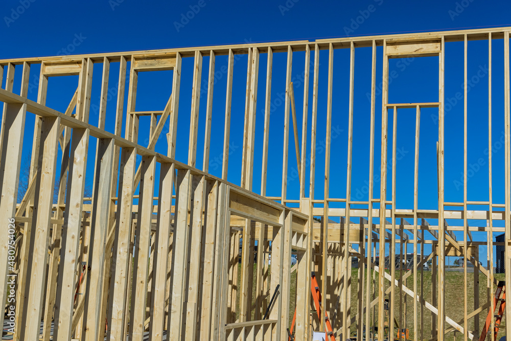 Obraz premium Framing beam of new house under construction home framing