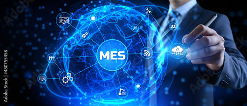MES Manufacturing execution system technology concept on virtual screen.