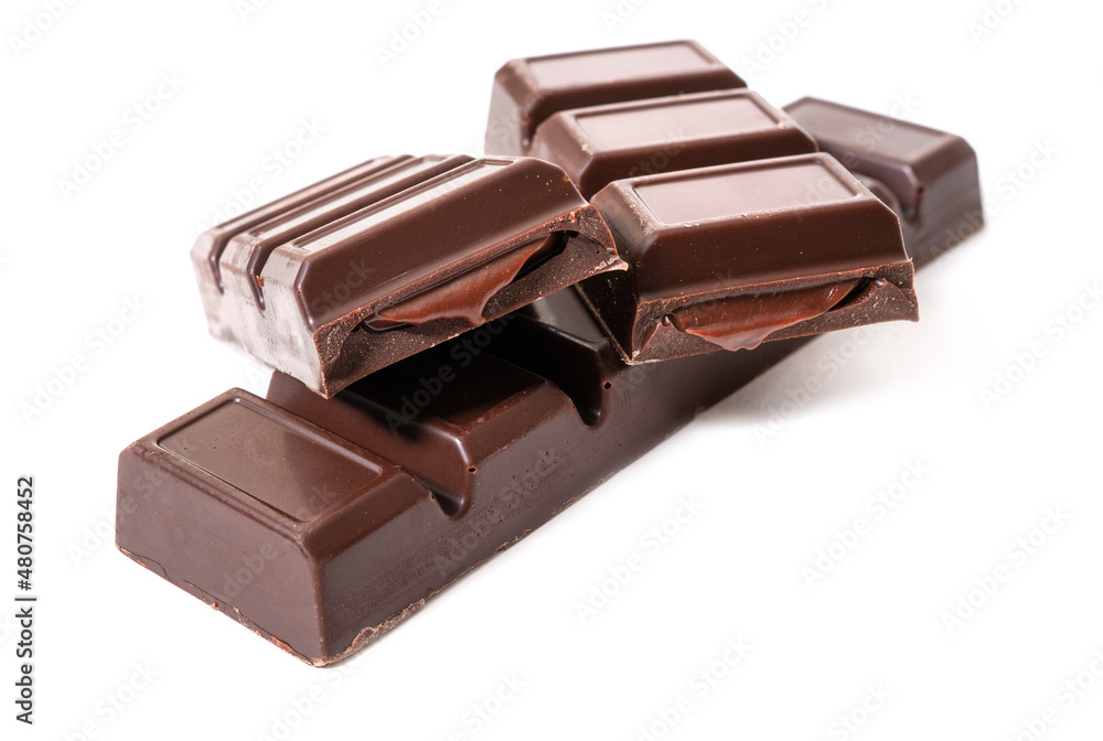 Pieces of chocolate bar with chocolate cream Pieces of chocolate bar with chocolate cream