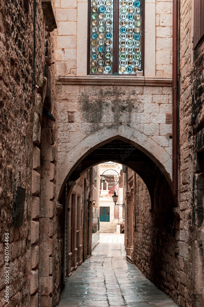 Ancient street passage view of Diocletian's Palace in old town of Split, Croatia