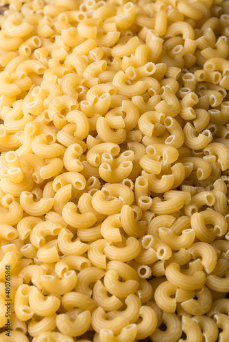 pile of pasta, closeup food background, diet and food concept, taken in shallow depth of field h copy space