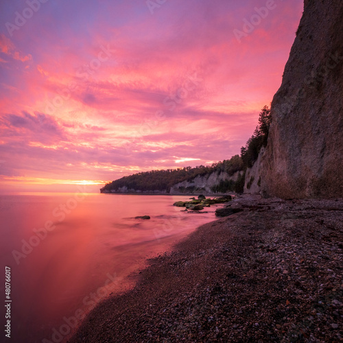 Panorama aerial view of sunset on the steep coast of the Black Sea.Panorama of wild romantic coastal cliff landscape