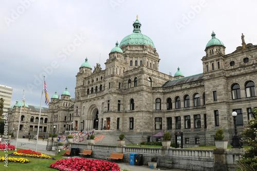 The British Columbia Parliament Building surrounded by flowerbeds