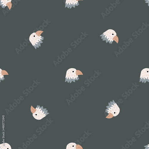 Eagle pattern seamless in freehand style. Head predator on colorful background. Vector illustration for textile.