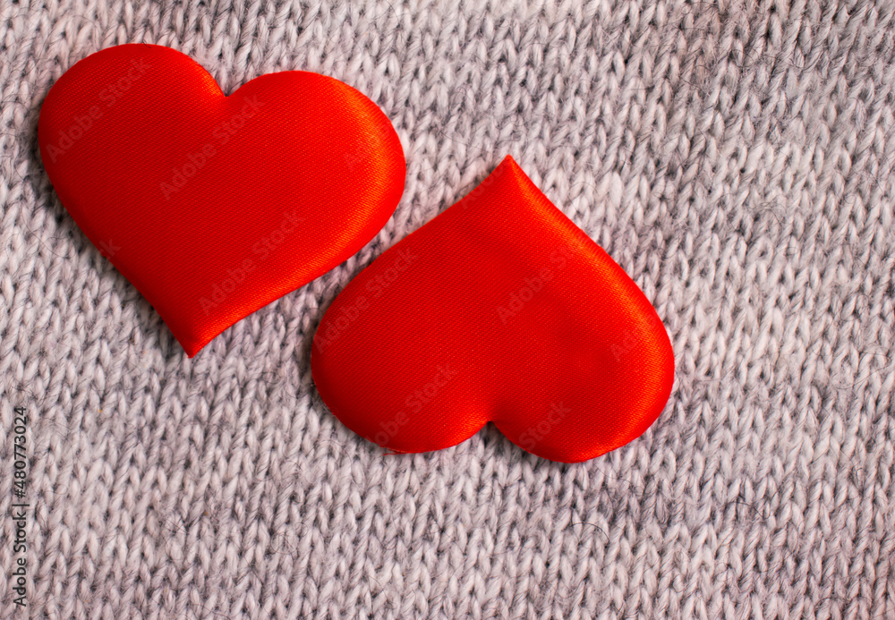 Obraz premium red heart on fabric background