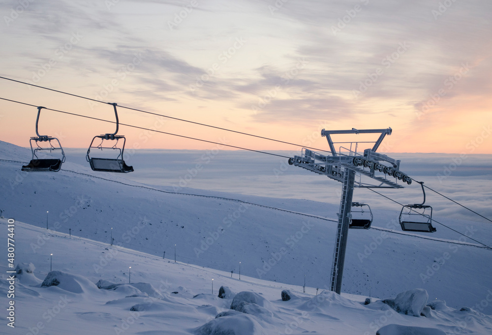 The chair lift on the Khibiny mountains in Kirovsk ski resort in the Murmansk region The chair lift on the Khibiny mountains in Kirovsk ski resort in the Murmansk region