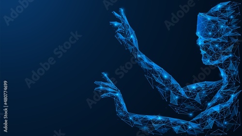 A man wearing augmented reality glasses. Virtual world management. Polygonal design of interconnected elements. Blue background.