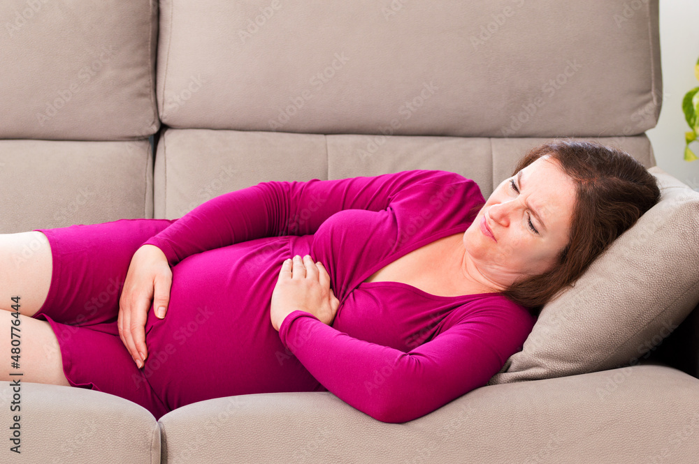 Pregnant suffering belly ache Pregnant suffering belly ache