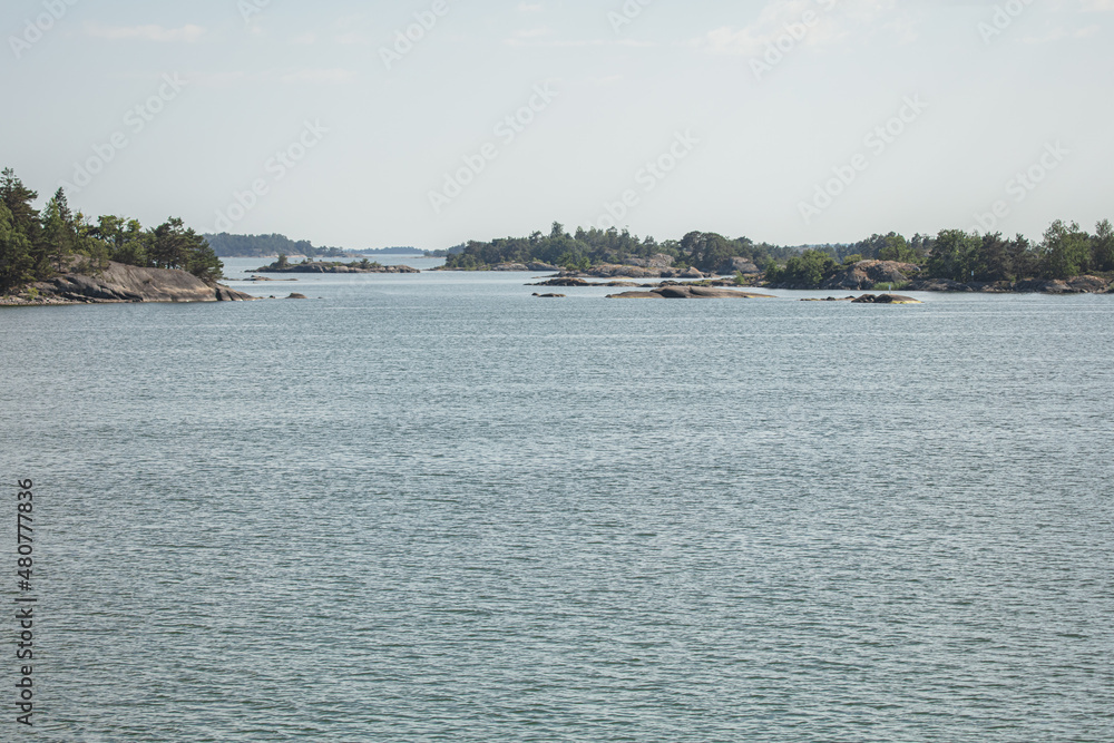 Rocky islands in the sea. Summer, sunny day Nature of Scandinavia. islands in the sea. Finland. Turku Archipelago