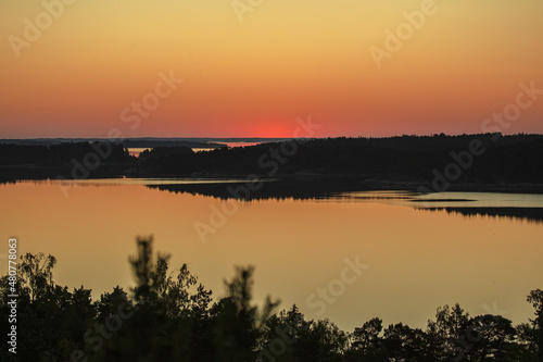 Early summer dawn over the sea. Nature of Scandinavia. islands in the sea. Finland. Turku Archipelago. © M.V.schiuma