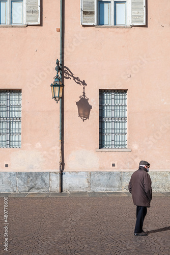 old italian man walking alone in center of Turin  © alessandro