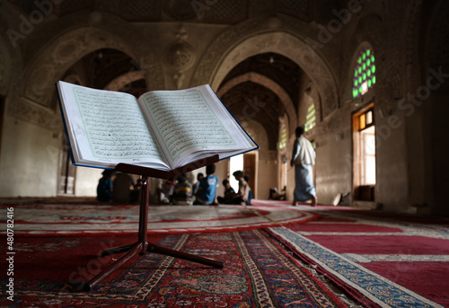 A picture of the Holy Quran in one of the historical mosques in the Yemeni city of Taiz, showing Surah Al-Kahf photo