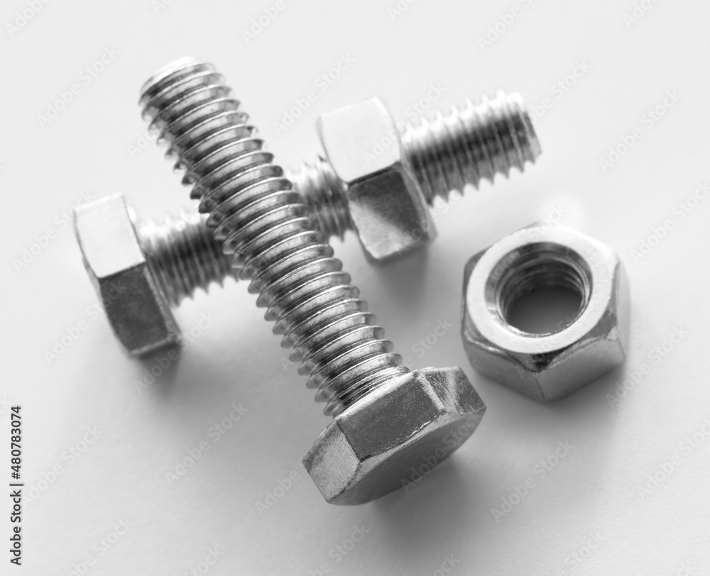 Metal nuts and bolts Isolated on white background Metal nuts and bolts Isolated on white background