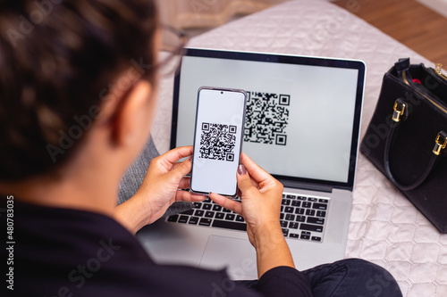 São Paulo, São Paulo - Brazil - Circa November 2020: New form of payment of bills and bills in Brazil. executive woman making payment using Pix