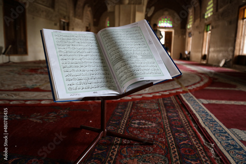 A picture of the Holy Quran in one of the historical mosques in the Yemeni city of Taiz, showing Surah Al-Kahf