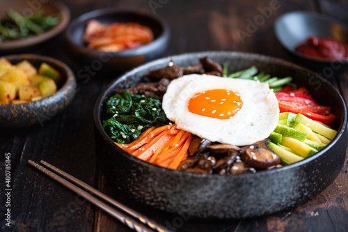  Bibimbap on a wooden background  traditional korean cuisine