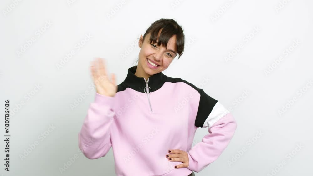 Pretty woman saluting with hand with happy expression over isolated background Pretty woman saluting with hand with happy expression over isolated background