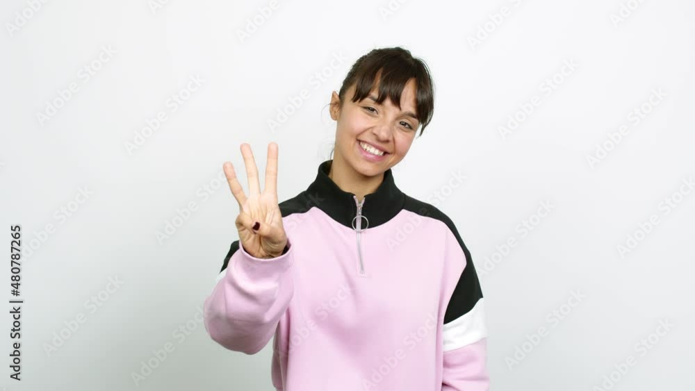 Pretty woman happy and counting with fingers over isolated background Pretty woman happy and counting with fingers over isolated background