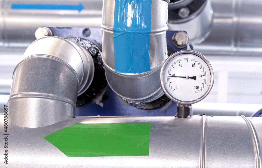 Thermometer on the pipeline in the gas boiler room. Thermometer on the pipeline in the gas boiler room.