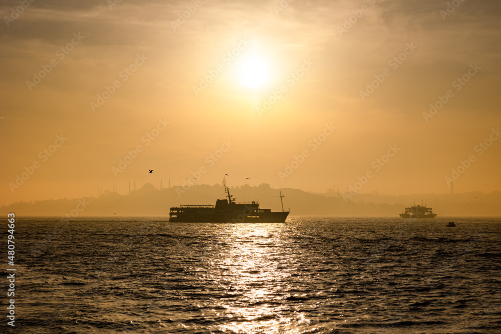 Istanbul background photo. Silhouette of ferries and cityscape of Istanbul
