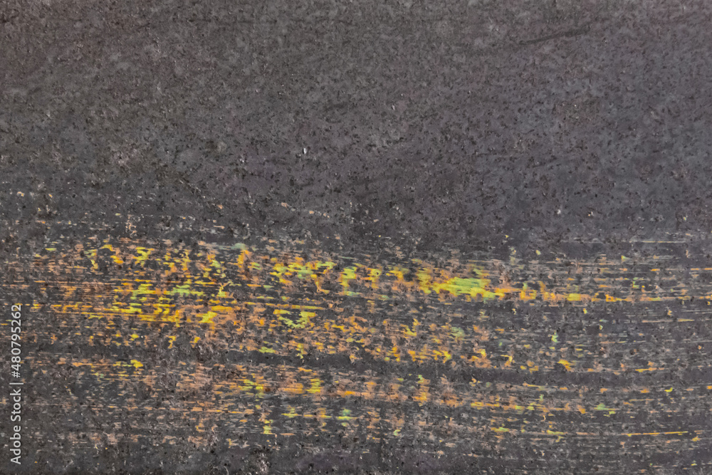 Obraz premium Abstract pattern of colored paint old design on dark background surface