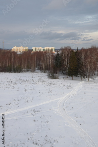 Photography New snow covered high rise residential buildings in a Russian city