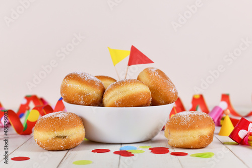 'Berliner Pfannkuchen', a traditional German donut like dessert filled with jam made from sweet yeast dough fried in fat. Traditional served during carnival.