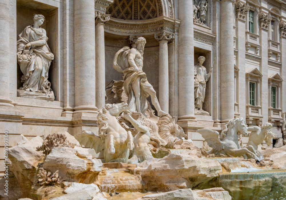 Fontana di Trevi Fountain by Nicola Salvi in front of Palazzo Poli Palace in Trevi quarter of historic Old Town city center of Rome in Italy Fontana di Trevi Fountain by Nicola Salvi in front of Palazzo Poli Palace in Trevi quarter of historic Old Town city center of Rome in Italy