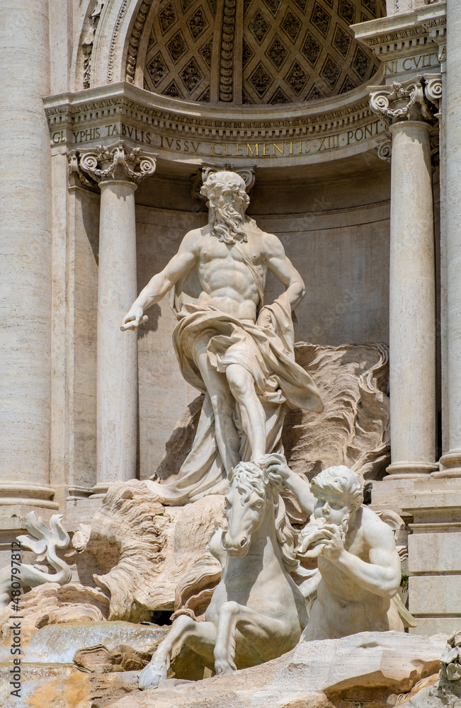 Mythical Oceanus and titan statues on Fontana di Trevi Fountain in front of Palazzo Poli Palace in Trevi quarter of historic Old Town city center of Rome in Italy