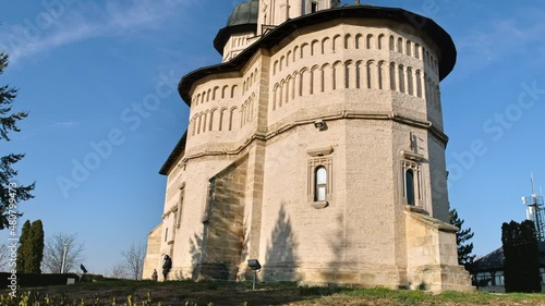 View of the Cetatuia Monastery in Iasi, Romania. Main church, inner court with greenery photo