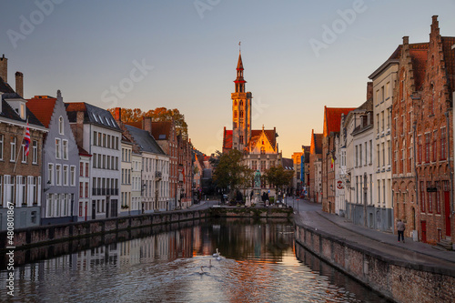 Spiegelrei canal and Jan Van Eyck Square In Brugge, Belgium at sunrise