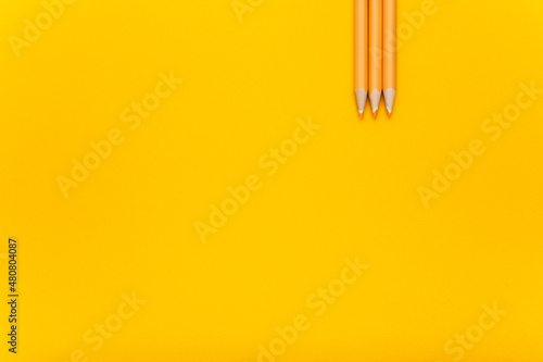 orange pencils on orange background