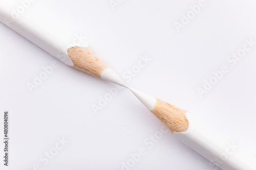 white pencils on white background closeup