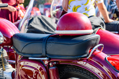 Tablou Canvas Closeup of the retro motorcycle on street fair