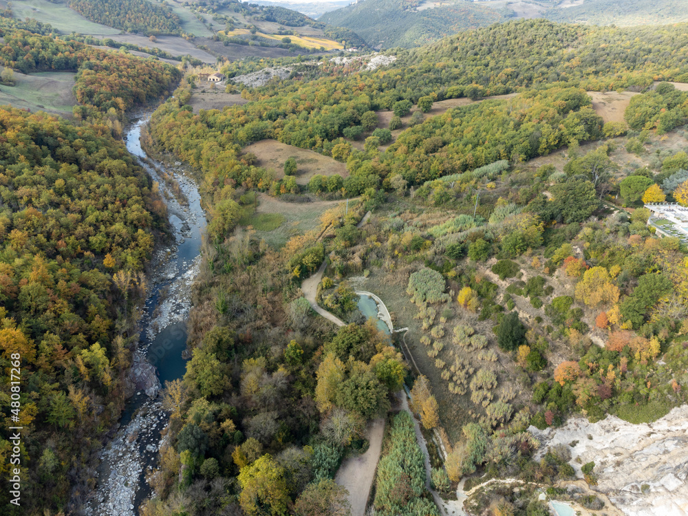 Fototapeta premium Aerial view on free hot thermal springs and pool in nature park Dei Mulini, Bagno Vignoni, Tuscany, Italy