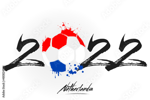 2022 and a abstract soccer ball painted in the colors of the Netherlands flag. 2022 and flag of Netherlands in the form of a soccer ball made of blots. Vector illustration on isolated background