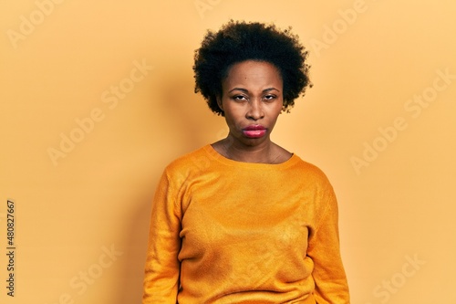 Young african american woman wearing casual clothes skeptic and nervous, frowning upset because of problem. negative person. © Krakenimages.com