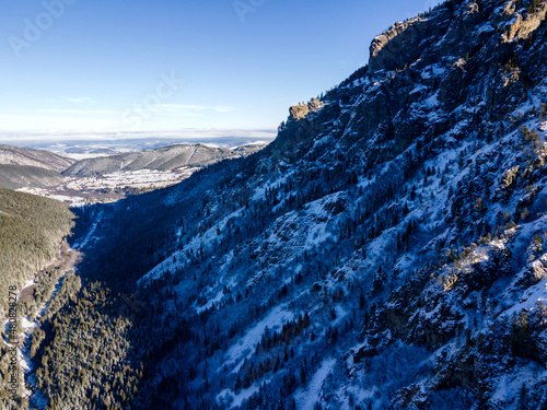 Aerial winter view of Rila Mountain near Beli Iskar river, Bulgaria photo