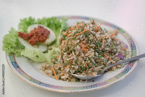 Nasi Ulam, a malay traditional herb rice. photo