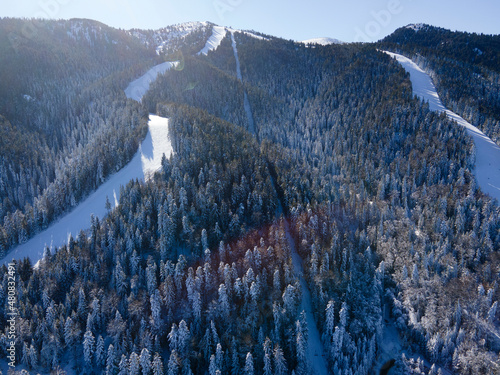 Aerial winter view of Rila Mountain near of Borovets, Bulgaria photo