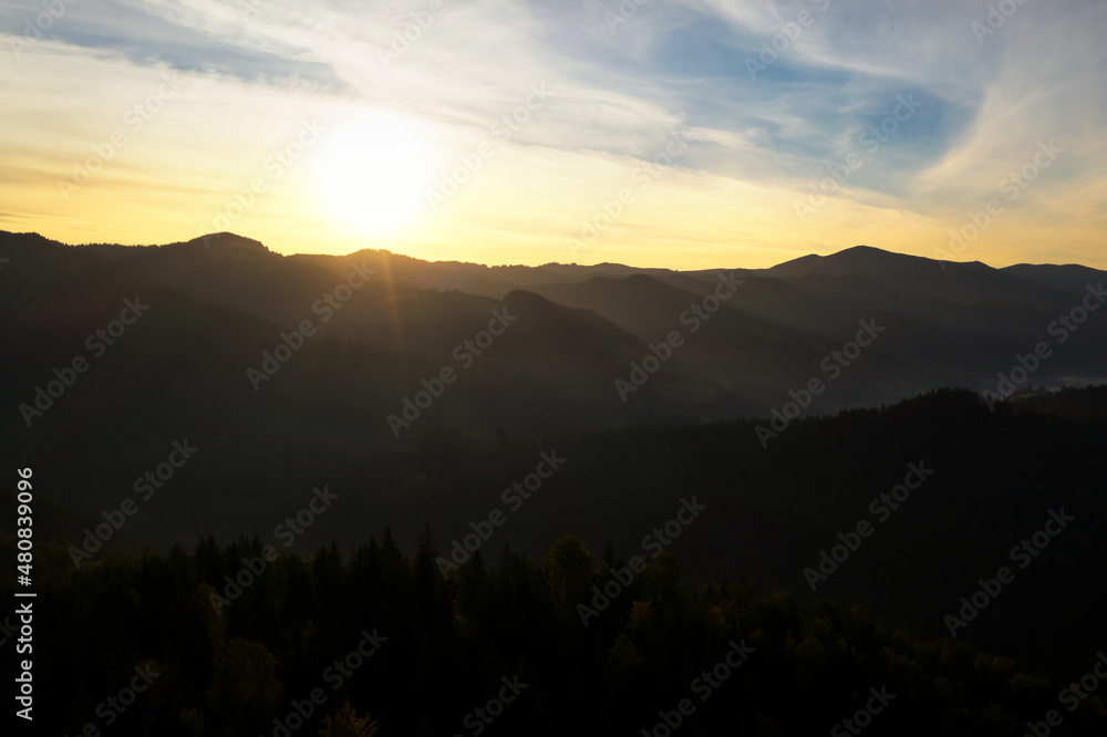 Picturesque view of mountain landscape and beautiful sky at sunrise. Drone photography