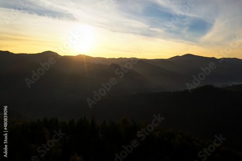 Picturesque view of mountain landscape and beautiful sky at sunrise. Drone photography
