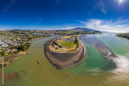 Aerial drone panoramic view over the seaside town of Raglan, on the West Coast of the Waikato region in the North Island of New Zealand.
