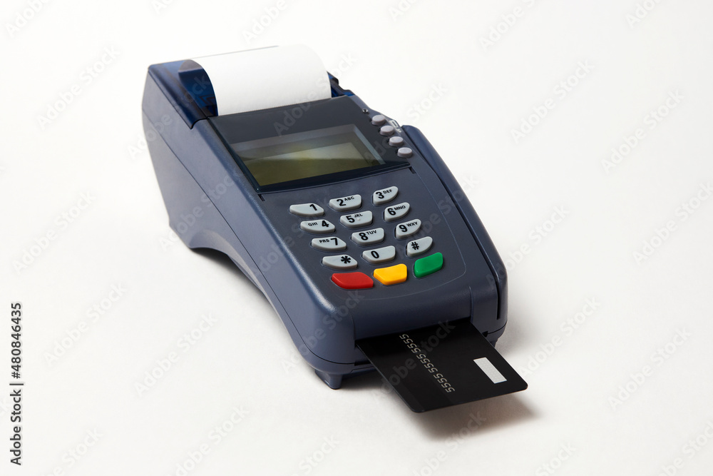 Payment terminal and credit card on white background Payment terminal and credit card on white background
